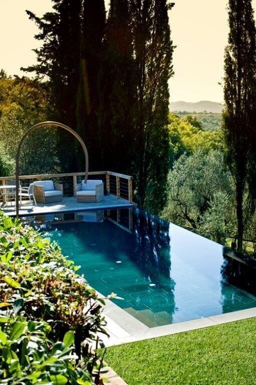 We found fantastic swimming pools surrounded by lovely landscapes complete with the best trees for pool landscape ideas you should not miss, especially if you are now designing or planning to renovate your yard. See more like this at backyardmastery.com