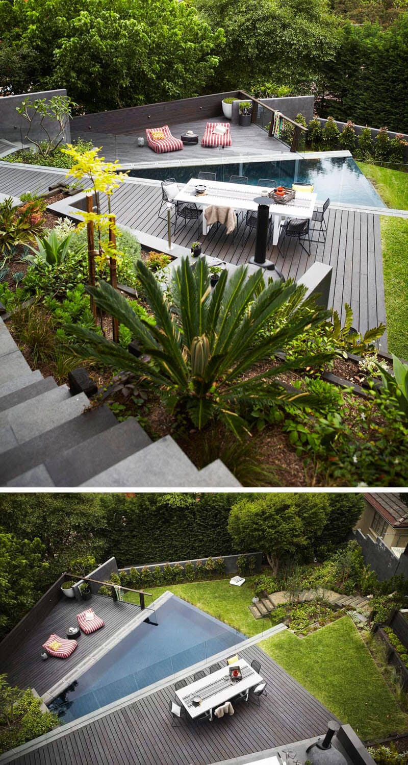 Contemporary landscape design features a dark timber deck with a swimming pool, adjacent dining area, and lush vegetation for a modern outdoor space.