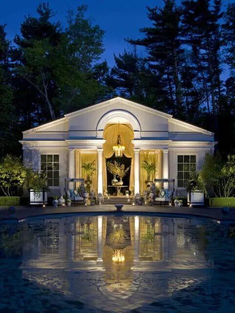 A backyard pool house may contain a lounging or relaxing area, an outdoor kitchen, a swimming pool bar, an outdoor living room, a room to store towels and pool accessories, a swimming pool support with tools, a guest house, or any other kind of pool complementing room!