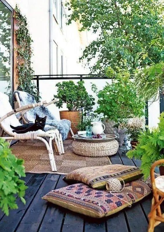 A great Bohemian garden needs some places where you can sit and enjoy everything. It makes a lot of sense to bring in some Bohemian styled furniture like your small couch and seats outside.